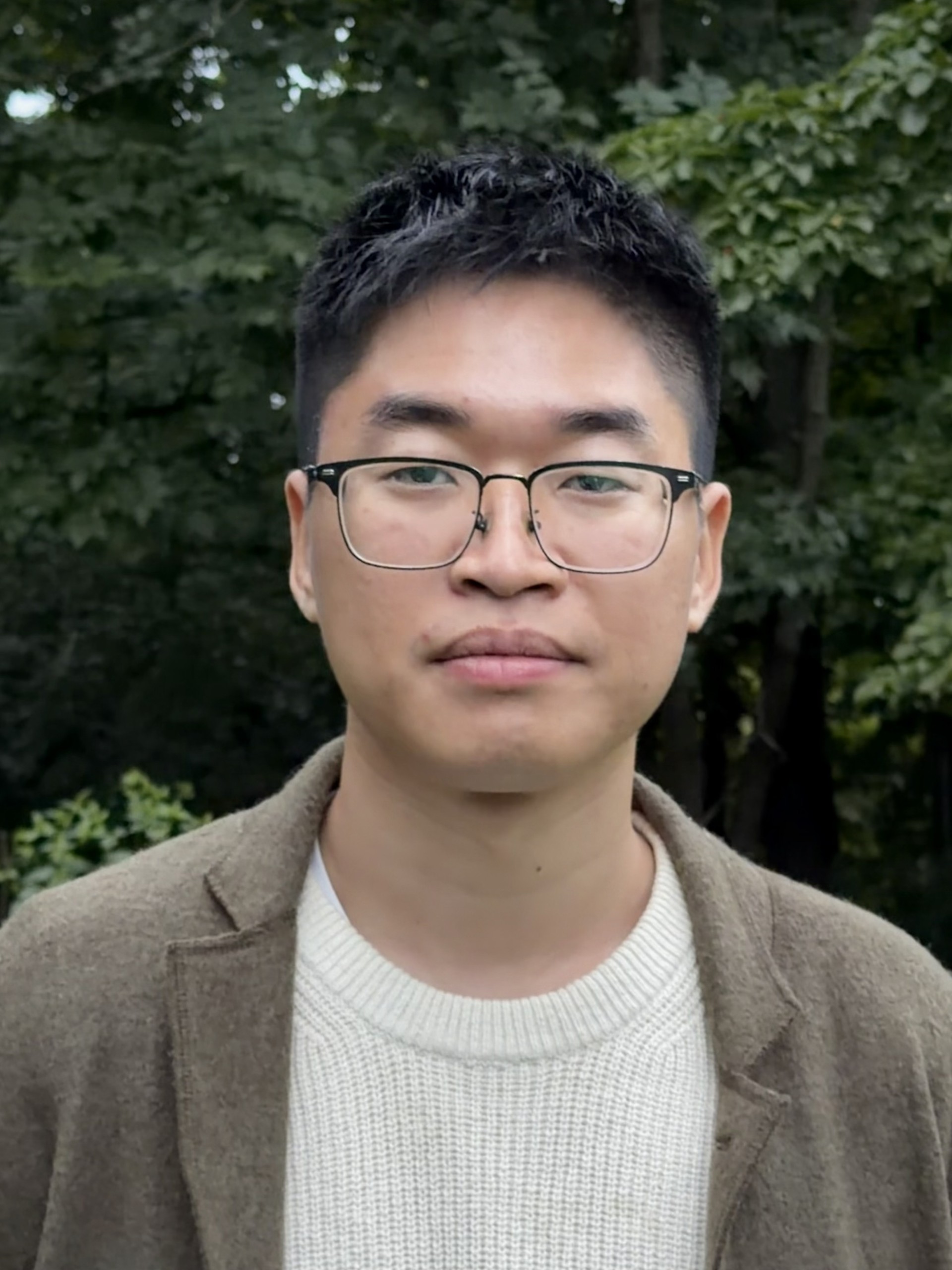 Portrait of Hao Peng outdoors